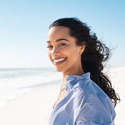 Lady smiles on beach