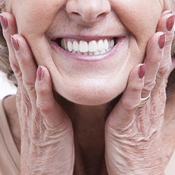 Closeup of patient smiling after dental implant surgery in Lady Lake 